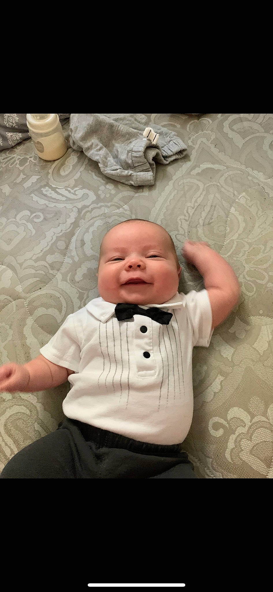 Finley is registered to the contest to win money with this photo: arm, baby, cheek, child, head, headwear, mouth, nose, person, photography, sitting, toddler