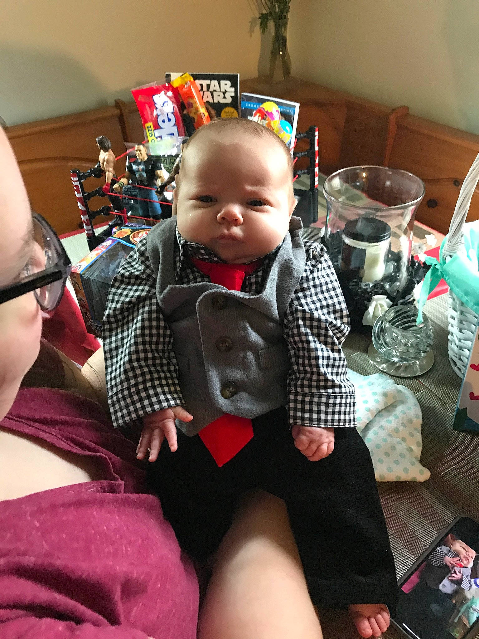 Finley joined the competition — help win amazing prizes! baby, child, lap, leg, pattern, person, plaid, play, room, sitting, toddler