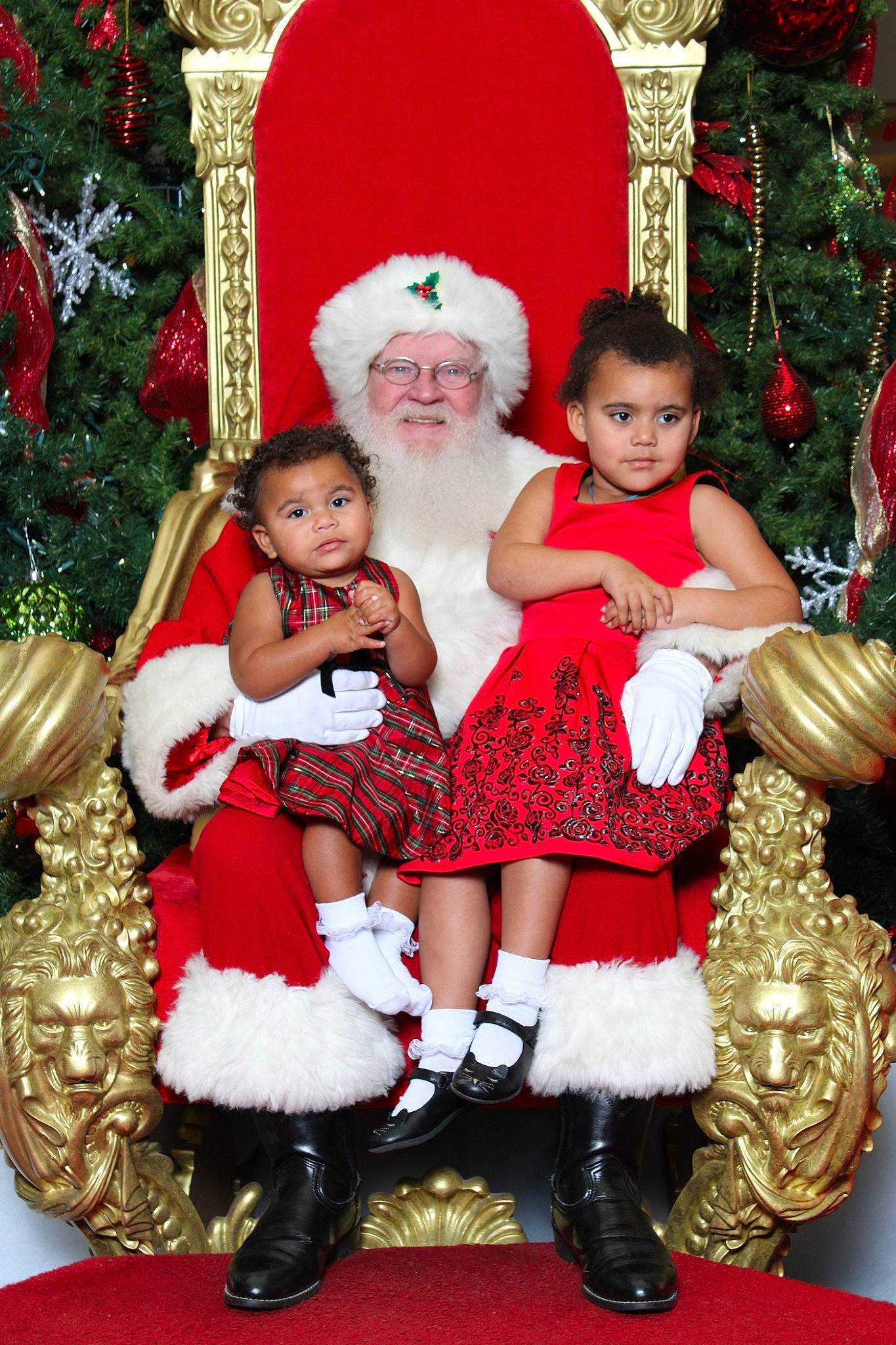 Desiree joined the competition — help win amazing prizes! child, christmas, christmas_decoration, christmas_ornament, christmas_tree, costume_hat, event, face, fun, happy, hat, head, headwear, holiday, human_body, joy, lap, person, red, santa_claus