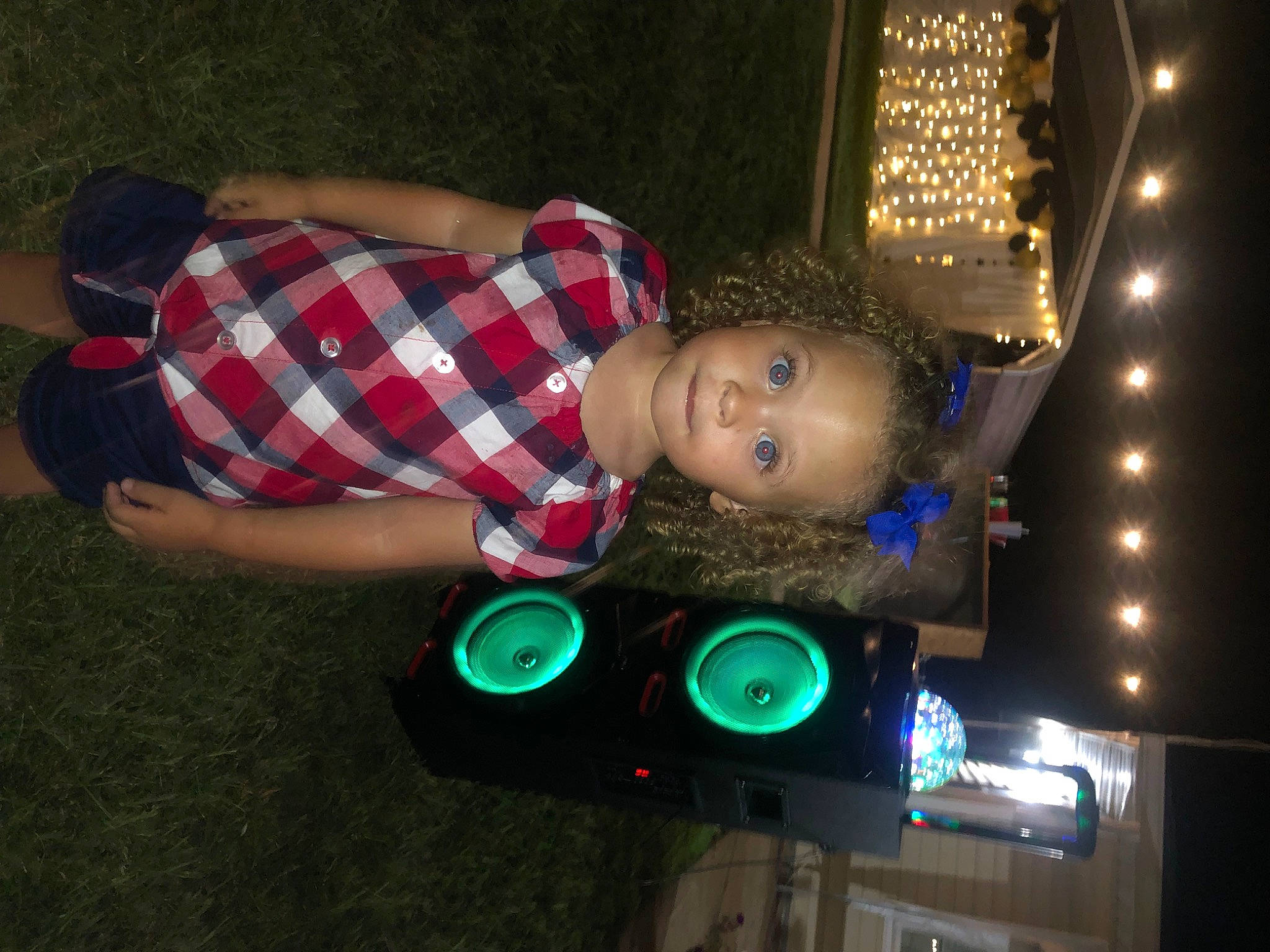 Zoe joined the competition — help win amazing prizes! audio_equipment, automotive_lighting, christmas, darkness, electric_blue, event, flash_photography, fun, holiday, interior_design, midnight, night, pattern, person, plaid, room, signaling_device, sitting, tartan, tree