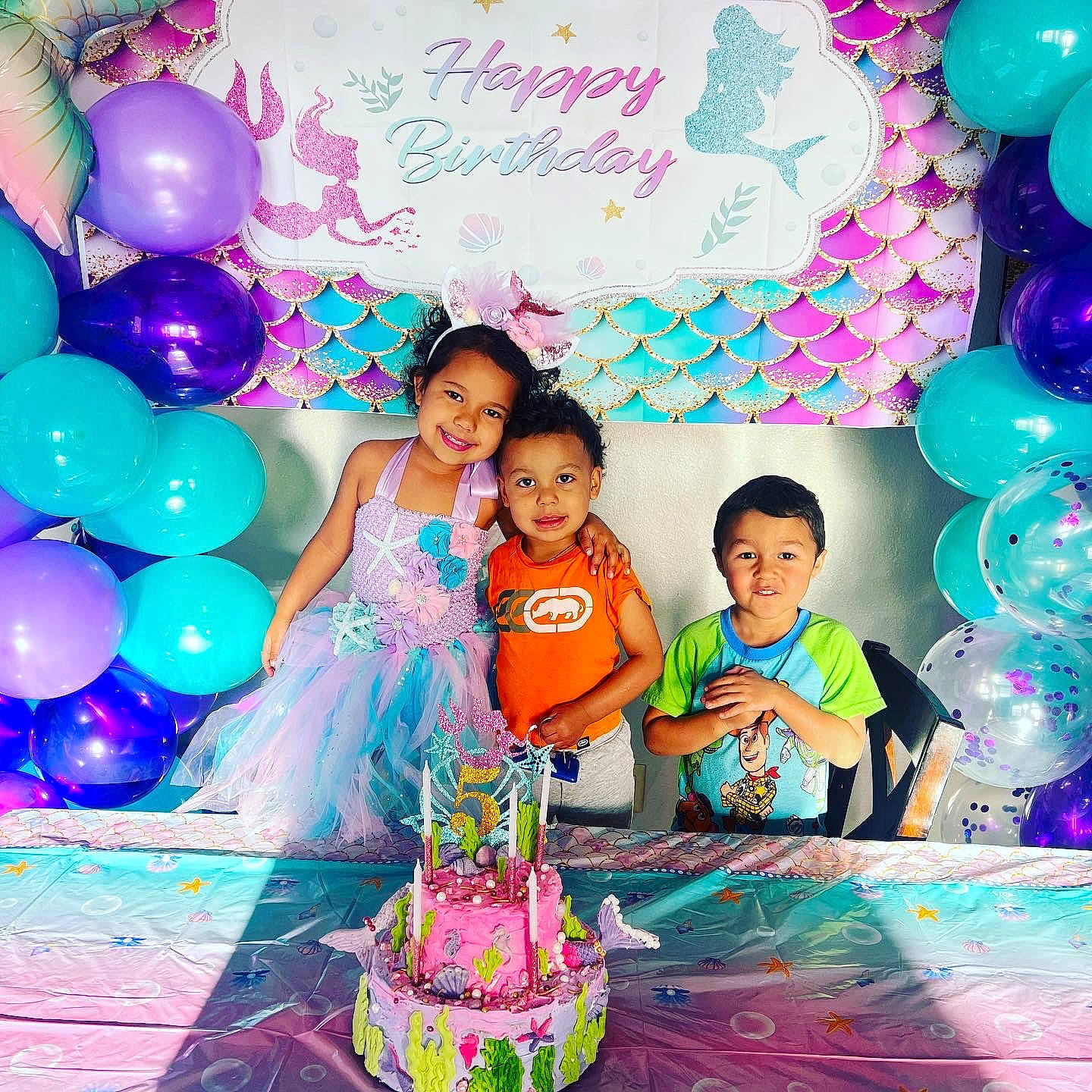 Camellia is registered to the contest to win money with this photo: balloon, birthday, birthday_party, blue, cake, cake_decorating, cake_decorating_supply, decoration, dress, event, fun, happy, joy, leisure, magenta, party_supply, person, pink, smile, snapshot