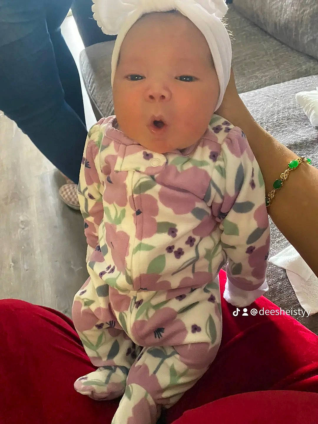 Laylani joined the competition — help win amazing prizes! baby, baby_products, baby_toddler_clothing, cap, cheek, child, comfort, eye, face, happy, head, human_leg, linens, mouth, person, pink, sitting, skin, sleeve, thigh