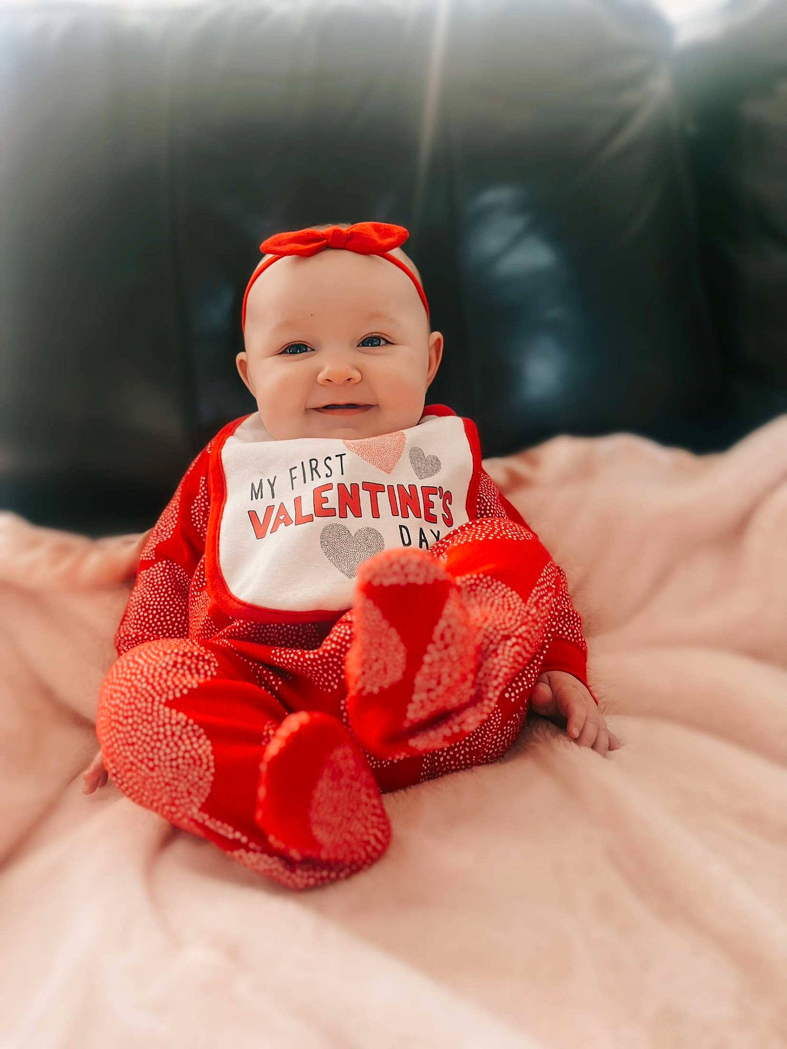 Gracelyn is registered to the contest to win money with this photo: baby, baby_products, baby_sleeping, baby_toddler_clothing, beanie, cap, carmine, child, comfort, dress, fur, happy, headwear, joy, linens, pattern, peach, person, sitting, sleeve