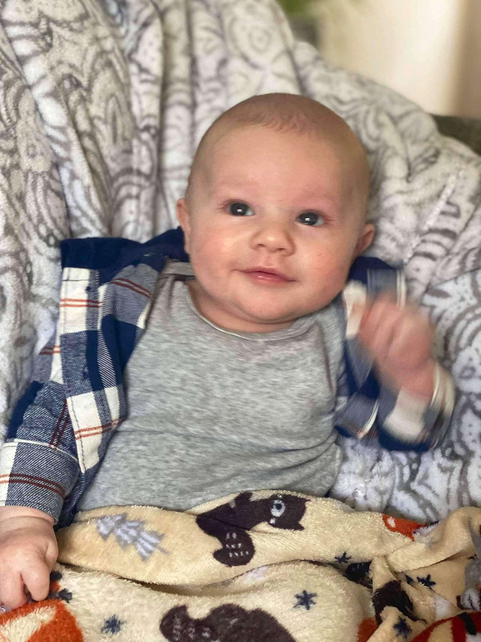 Elisha joined the competition — help win amazing prizes! baby, baby_toddler_clothing, black, cheek, child, comfort, facial_expression, finger, human, iris, people, person, photograph, product, skin, sleeve, smile, t_shirt, toddler, white