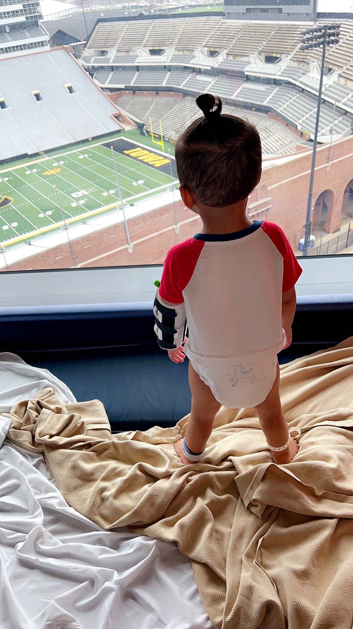 Makai joined the competition — help win amazing prizes! baby, baby_toddler_clothing, barefoot, child, flooring, fun, human_leg, joint, leisure, light, person, play, recreation, shorts, sport_venue, sportswear, standing, t_shirt, toddler, white