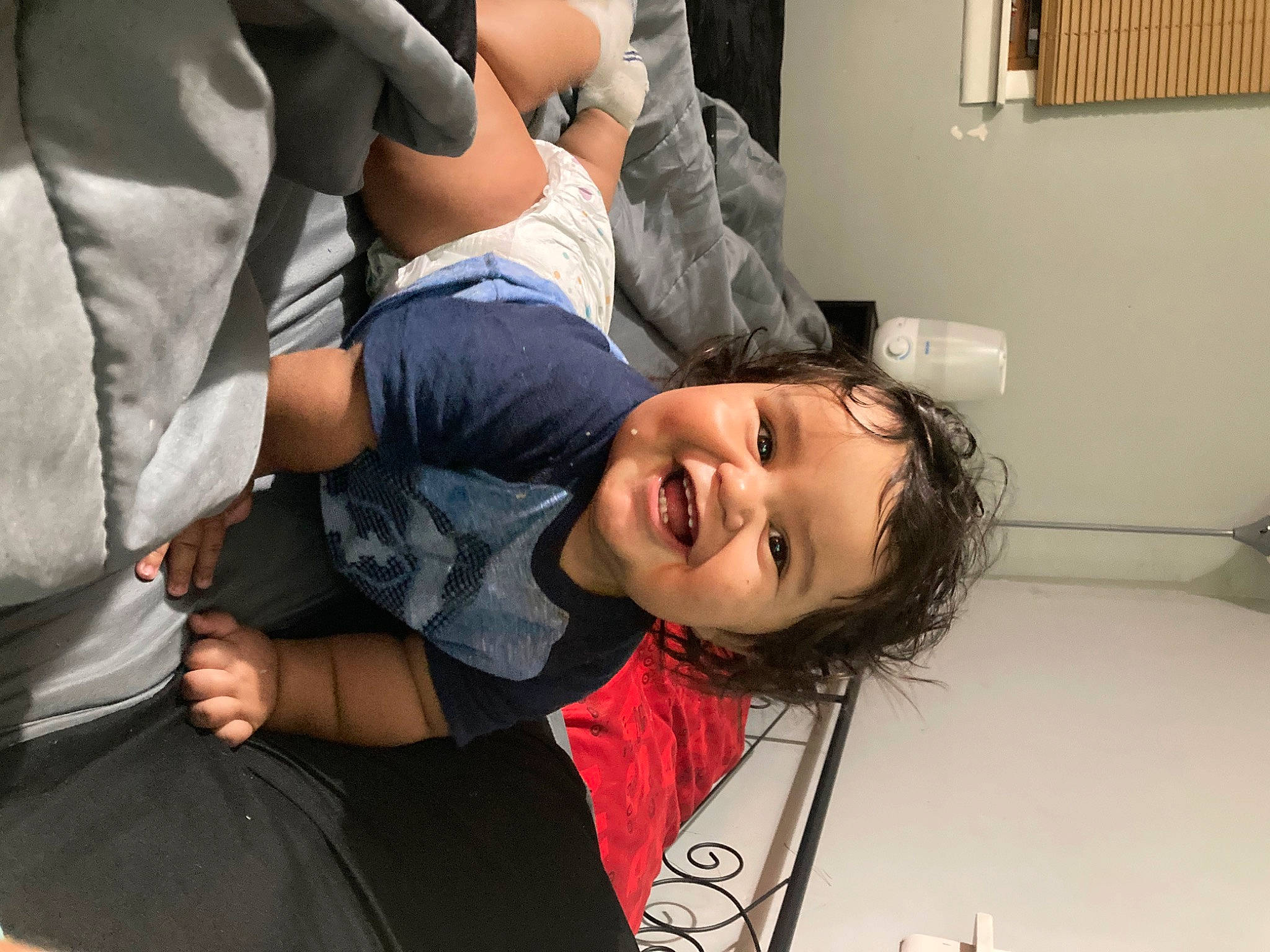 Alistaire is registered to the contest to win money with this photo: arm, child, comfort, elbow, event, eyelash, eyewear, fun, gesture, hand, happy, joint, joy, person, room, service, sitting, smile, t_shirt, toddler