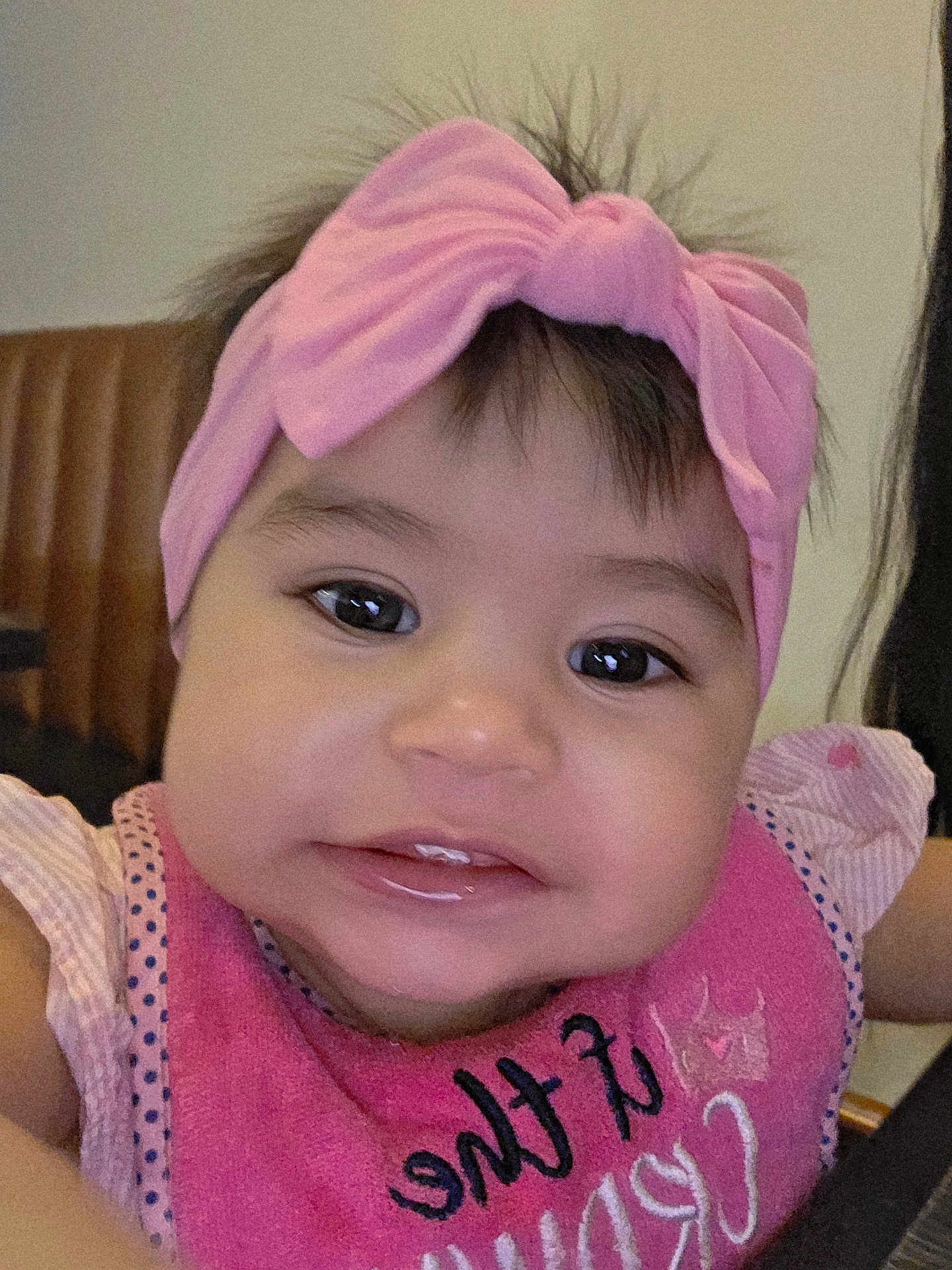 Abryana is registered to the contest to win money with this photo: baby, child, girl, headband, pink, bib, smile, face, portrait, indoor, cute, drool, clothing, young, infant, cheeks, eyes, expression, person, adorable