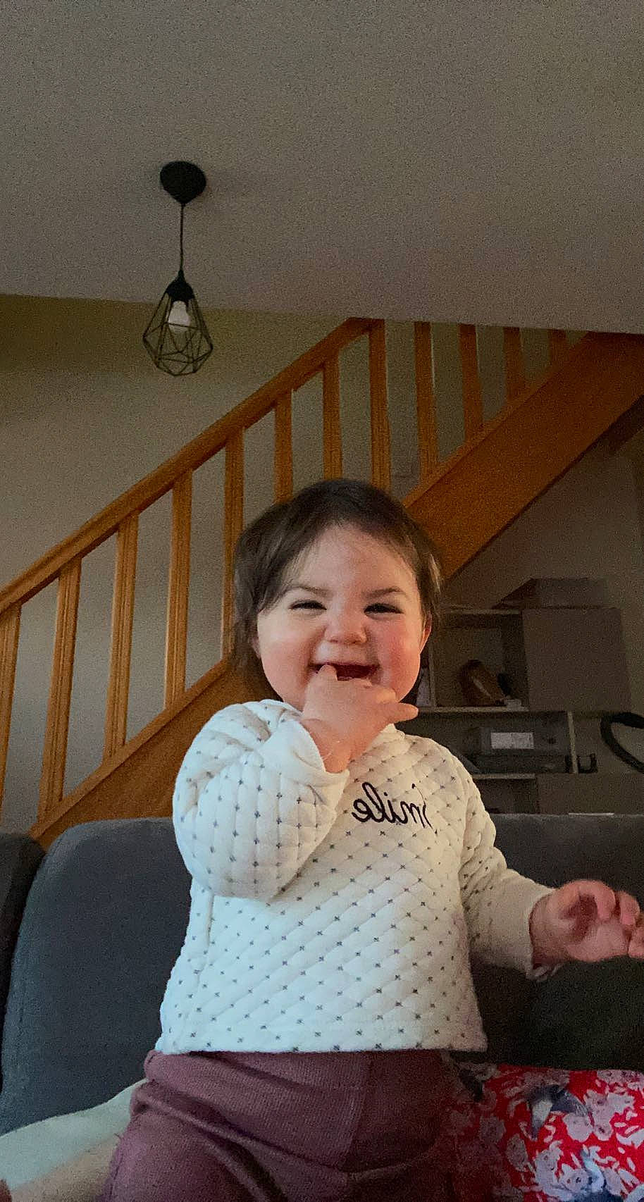 Luna participe au concours pour gagner de l'argent avec cette photo : baby, baby_toddler_clothing, child, comfort, cooking, flooring, fun, gesture, happy, hardwood, joy, kitchen_appliance, linens, pattern, person, sitting, sleeve, smile, standing, tableware