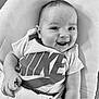 Luca a rejoint le concours — aidez-le/la à gagner de superbes lots ! baby, infant, smiling, face, person, clothing, nike, shirt, cushion, seat, happy, tongue, hand, arm, monochrome, black_and_white, portrait, cute, child, indoors