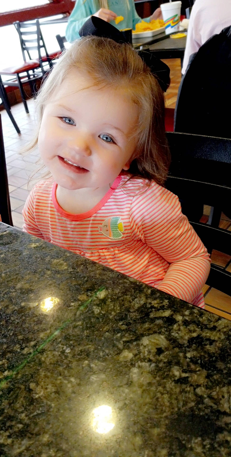 Carmen joined the competition — help win amazing prizes! baby_toddler_clothing, blond, chair, cheek, child, eye, face, floor, flooring, fun, happy, head, iris, joy, nose, person, skin, smile, soil, t_shirt