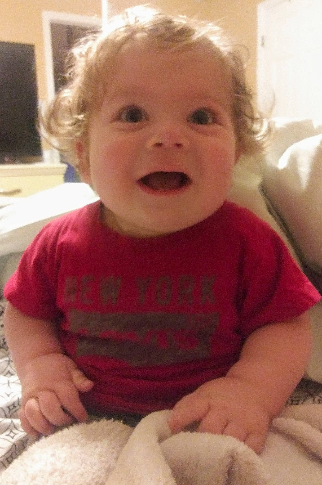 Kruz is registered to the contest to win money with this photo: baby, cheek, child, chin, ear, eye, face, facial_expression, head, laugh, lip, mouth, nose, person, play, sitting, skin, smile, toddler