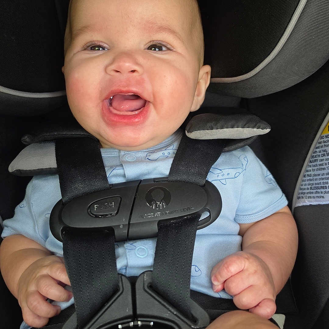Zachariah is registered to the contest to win money with this photo: baby, car_seat, smiling, infant, child, safety_harness, blue_clothing, happy, cute, portrait, seat_belt, infant_clothing, child_safety, baby_face, baby_hands, car_interior, infant_seat, childhood, baby_expression, young_child