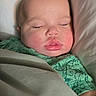 Zachariah joined the competition — help win amazing prizes! baby, sleeping, blanket, pillow, face, child, cozy, peaceful, resting, indoors, green_shirt, infant, cute, soft_lighting, portrait, closeup, skin, head, closed_eyes, toddler
