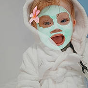 Harlow-george is registered to the contest to win money with this photo: baby, bodypart, clothing, costume, face, finger, flower, hand, happy, hat, head, hood, hoodie, knitwear, person, photography, portrait, smile, sweater, sweatshirt