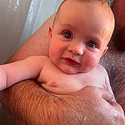 William joined the competition — help win amazing prizes! baby, child, arm, water, wet_skin, close_up, bath, skin, hand, adult, holding, portrait, face, blue_eyes, expression, human, naked_upper_body, hairy_arm, intimate, indoor