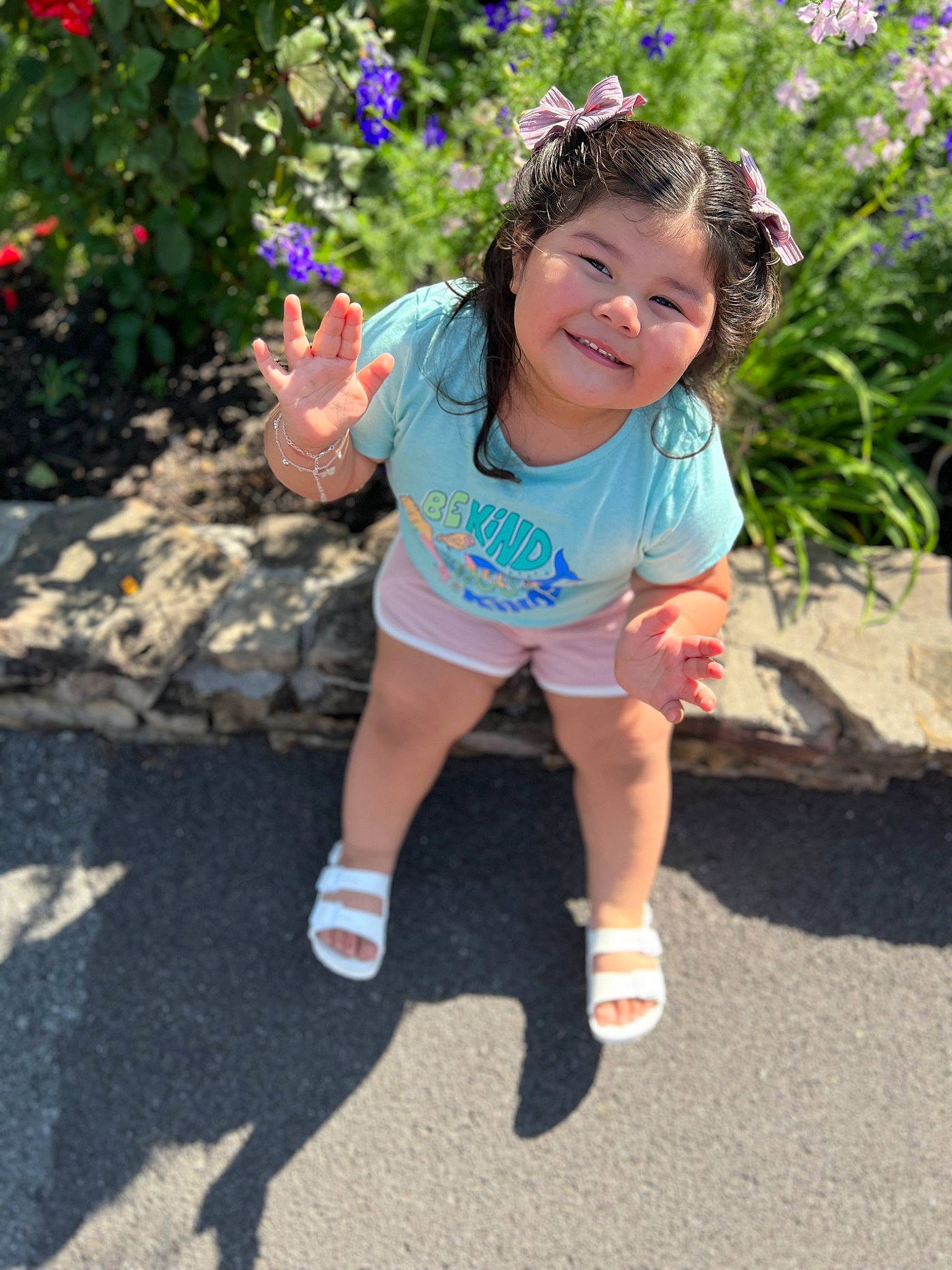 Arabella is registered to the contest to win money with this photo: electric_blue, eye, face, flower, fun, grass, happy, human_leg, joy, leisure, magenta, person, pink, plant, recreation, shorts, sleeve, smile, summer, t_shirt