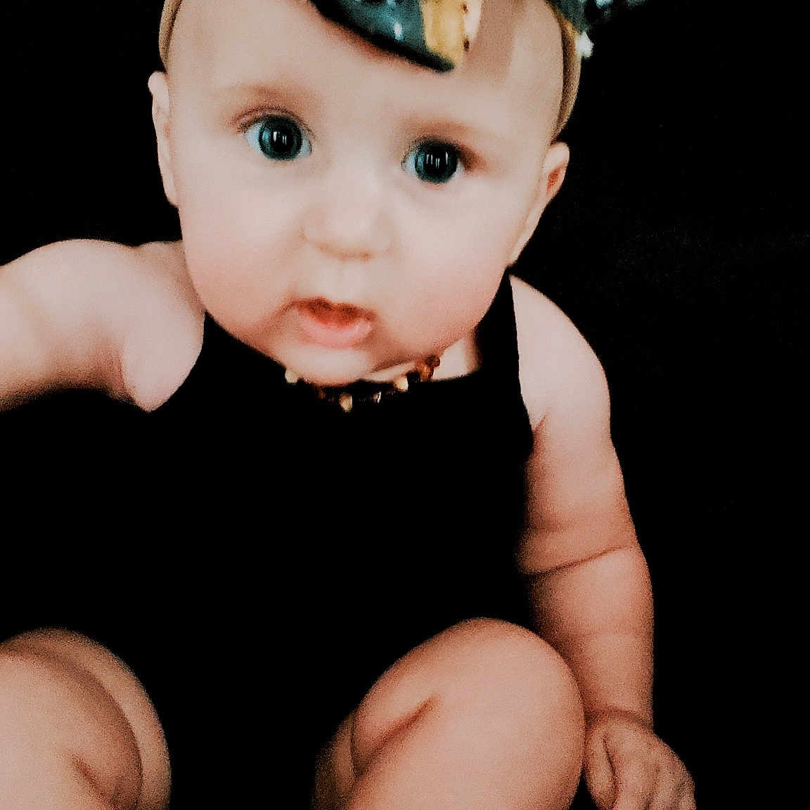 Pyper is registered to the contest to win money with this photo: baby, cheek, child, child_model, costume_accessory, fashion_accessory, forehead, hair_accessory, hand, head, headband, headgear, headpiece, toddler