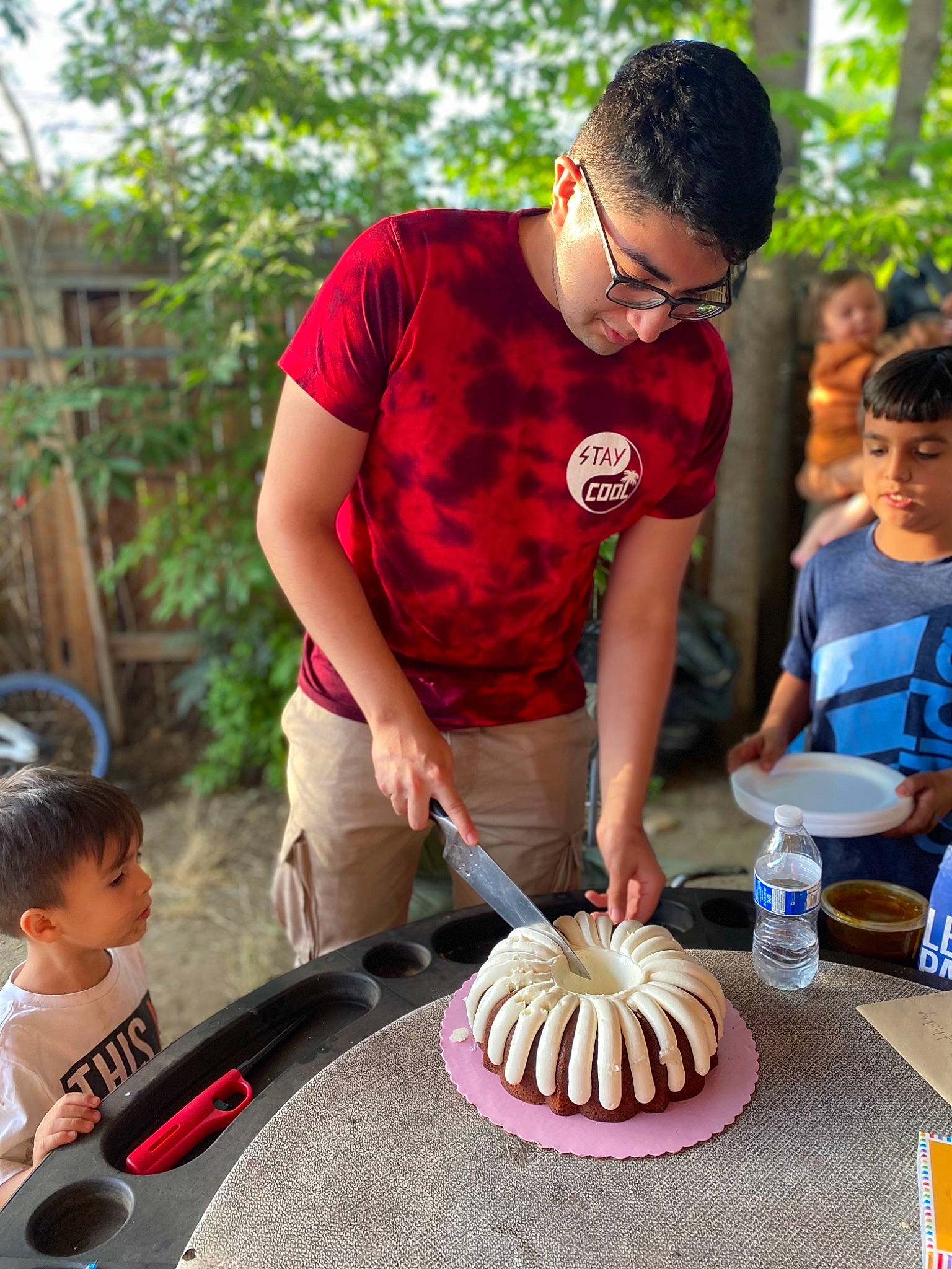 Gael joined the competition — help win amazing prizes! baked_goods, birthday_cake, blurred, cake, cake_decorating, cooking, cuisine, dessert, dish, food, fun, ingredient, leisure, person, plant, plate, recipe, sharing, shorts, t_shirt