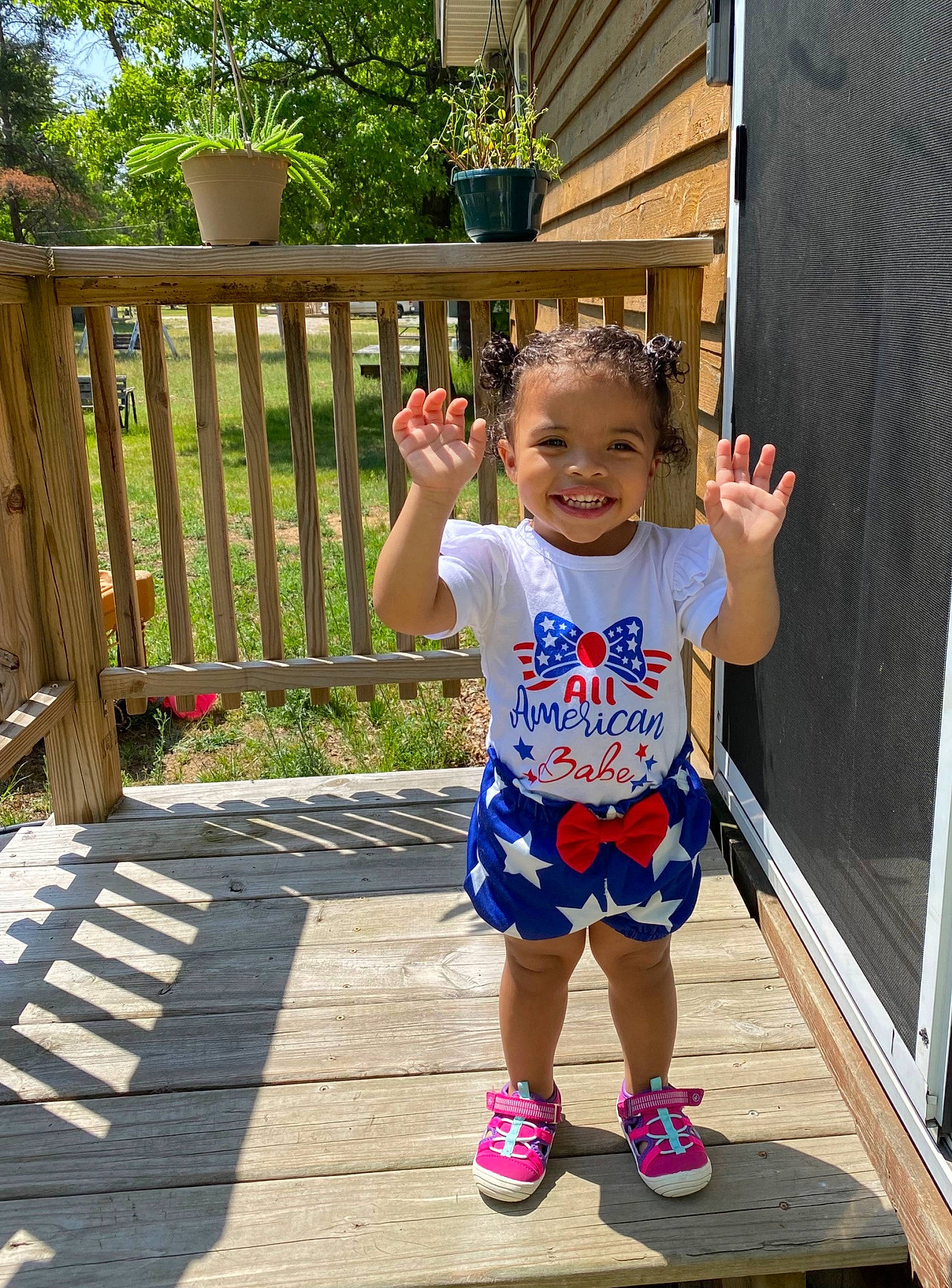 Ocean joined the competition — help win amazing prizes! baby_toddler_clothing, chair, child, deck, electric_blue, flowerpot, fun, grass, happy, joy, leisure, person, plant, porch, recreation, sitting, smile, t_shirt, toddler, tree