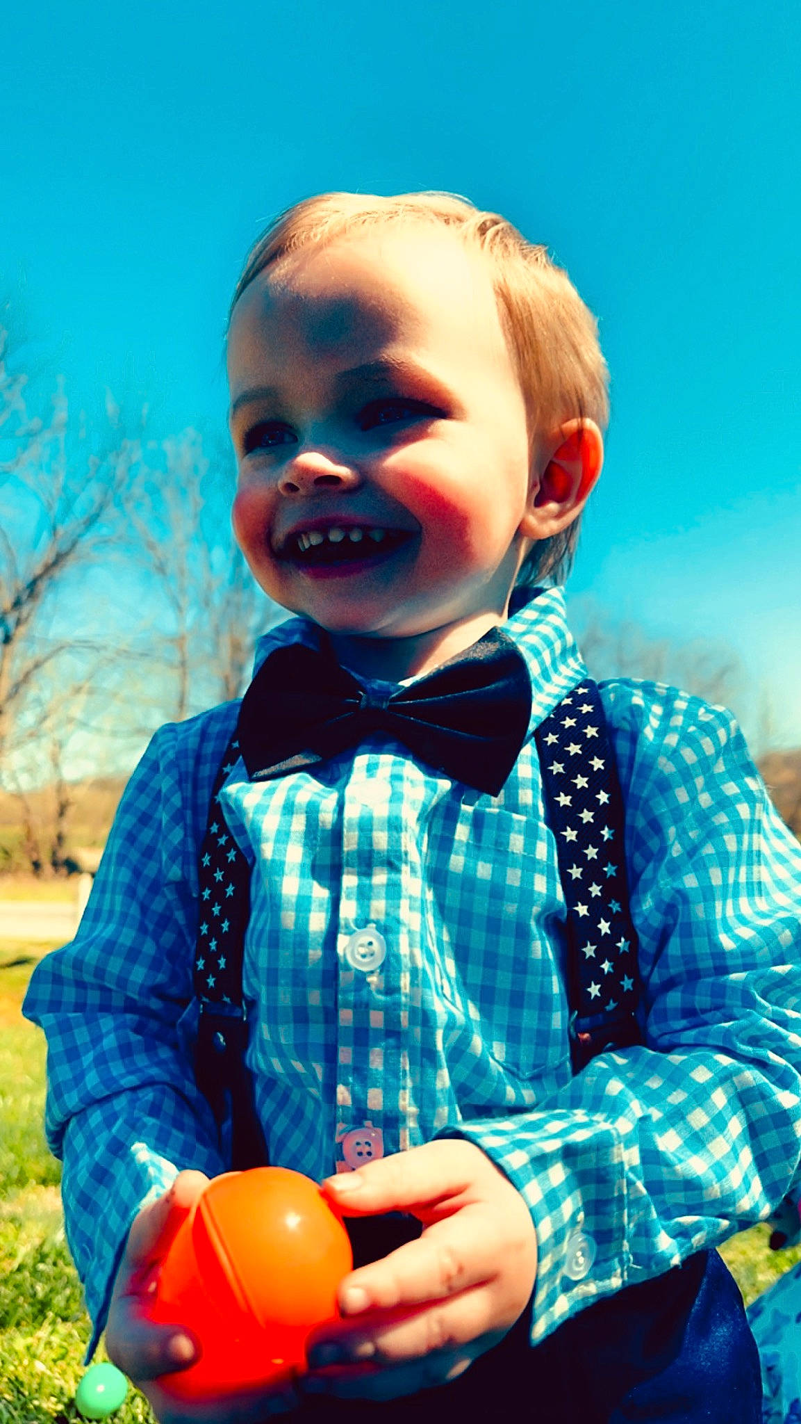 Bryson joined the competition — help win amazing prizes! azure, baby_toddler_clothing, blue, bow_tie, collar, dress_shirt, electric_blue, fun, happy, headgear, joy, orange, people_in_nature, person, plaid, red, sky, sleeve, standing, tartan