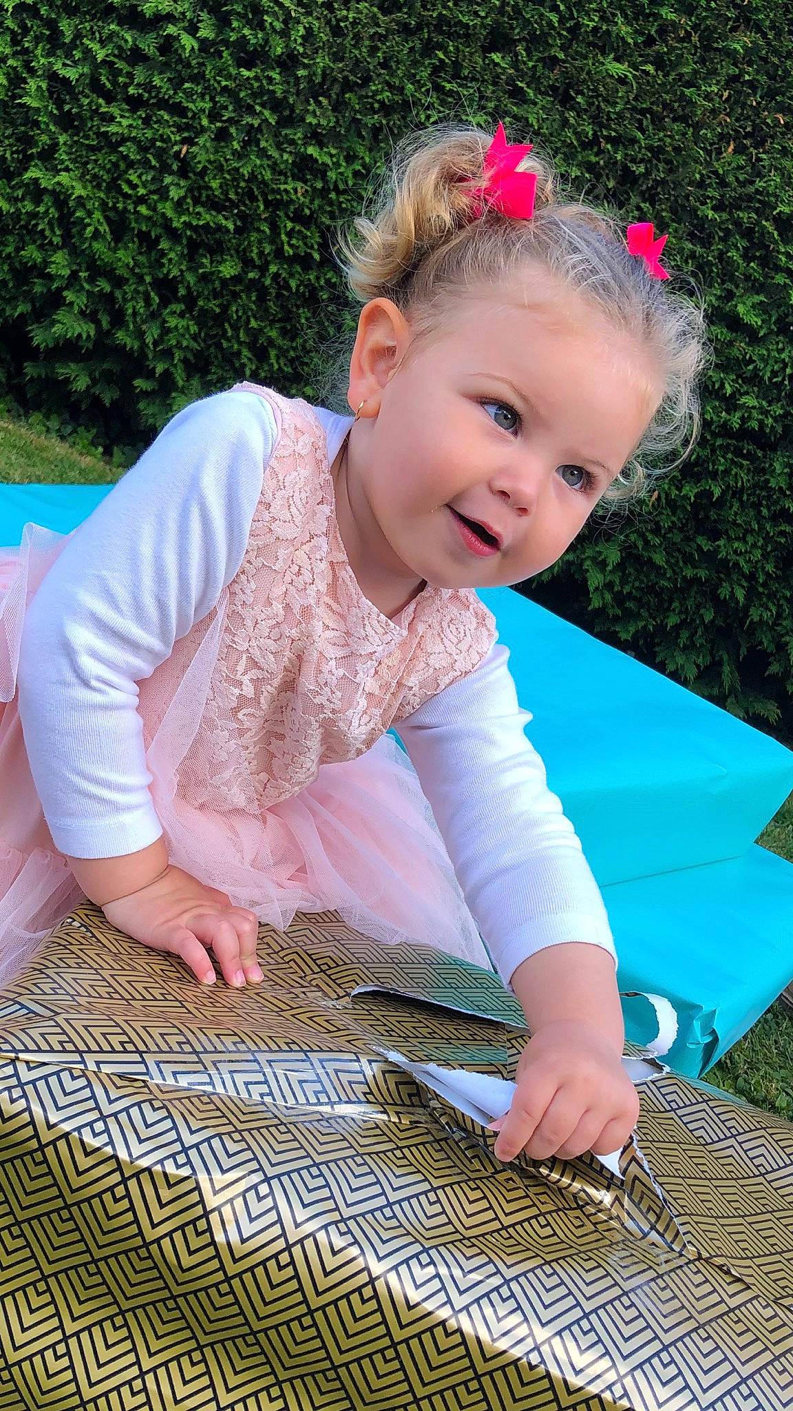 Alyah participe au concours pour gagner de l'argent avec cette photo : baby_toddler_clothing, beauty, blue, dress, face, flooring, grass, green, happy, headpiece, pattern, person, photograph, pink, recreation, skin, sleeve, smile, summer, textile
