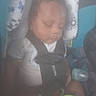 Raiden is registered to the contest to win money with this photo: baby, car_seat, child, close_up, clothing, cute, face, hand, head, indoor, infant, nap, pacifier, person, resting, seat_belt, sleeping, soft_toy, straps, toy