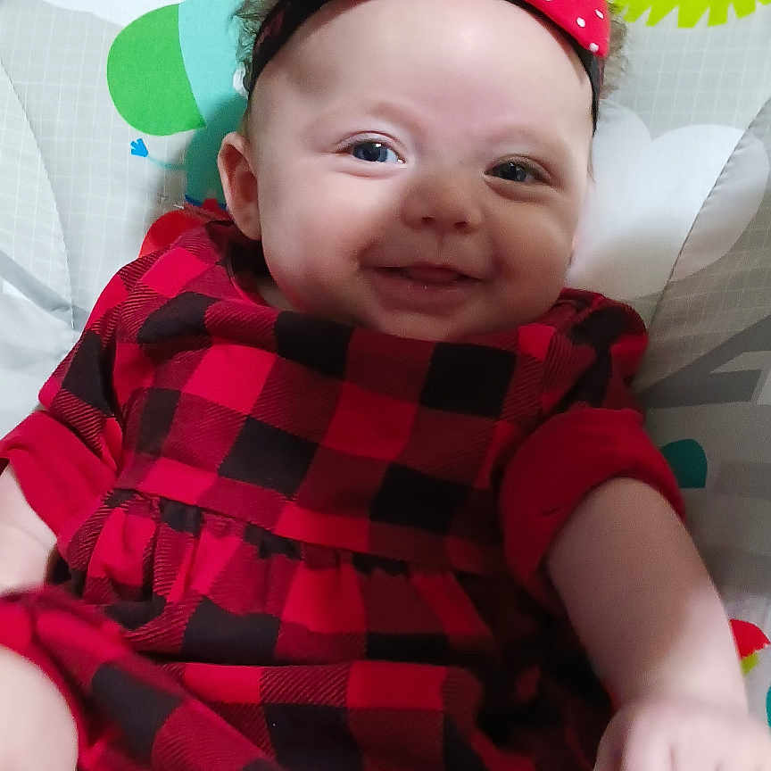 Sansa joined the competition — help win amazing prizes! accessories, adult, baby, clothing, couch, cushion, face, female, furniture, happy, hat, head, homedecor, person, photography, portrait, shorts, smile, t_shirt, woman