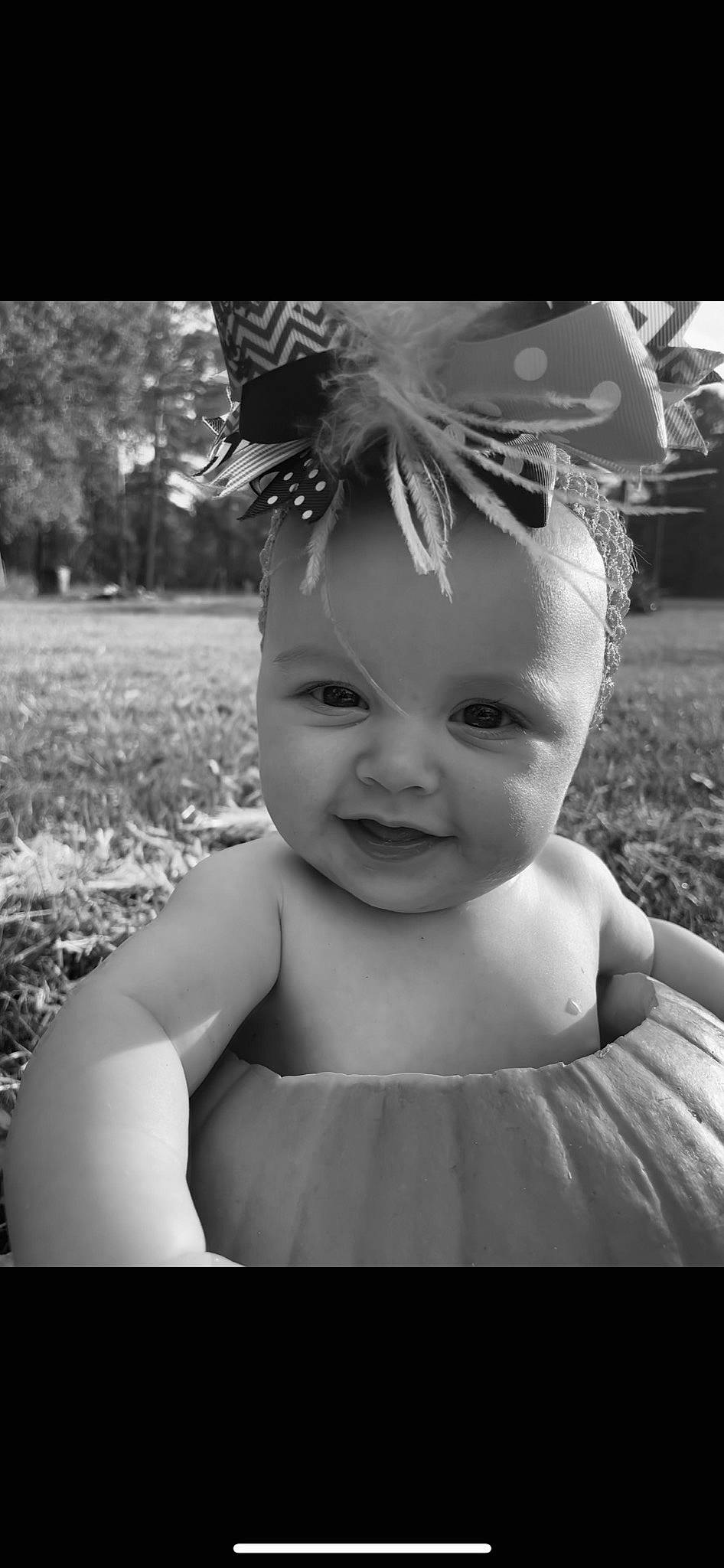 Legend is registered to the contest to win money with this photo: black_and_white, cap, child, cool, costume_hat, eye, eyebrow, flash_photography, fun, grass, happy, hat, headgear, headpiece, iris, person, plant, smile, standing, style
