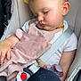 baby, sleeping, car_seat, blanket, pacifier, clothing, straps, safety, child, cute, infant, rest, peaceful, comfort, seatbelt, head, face, hand, footwear, toy
