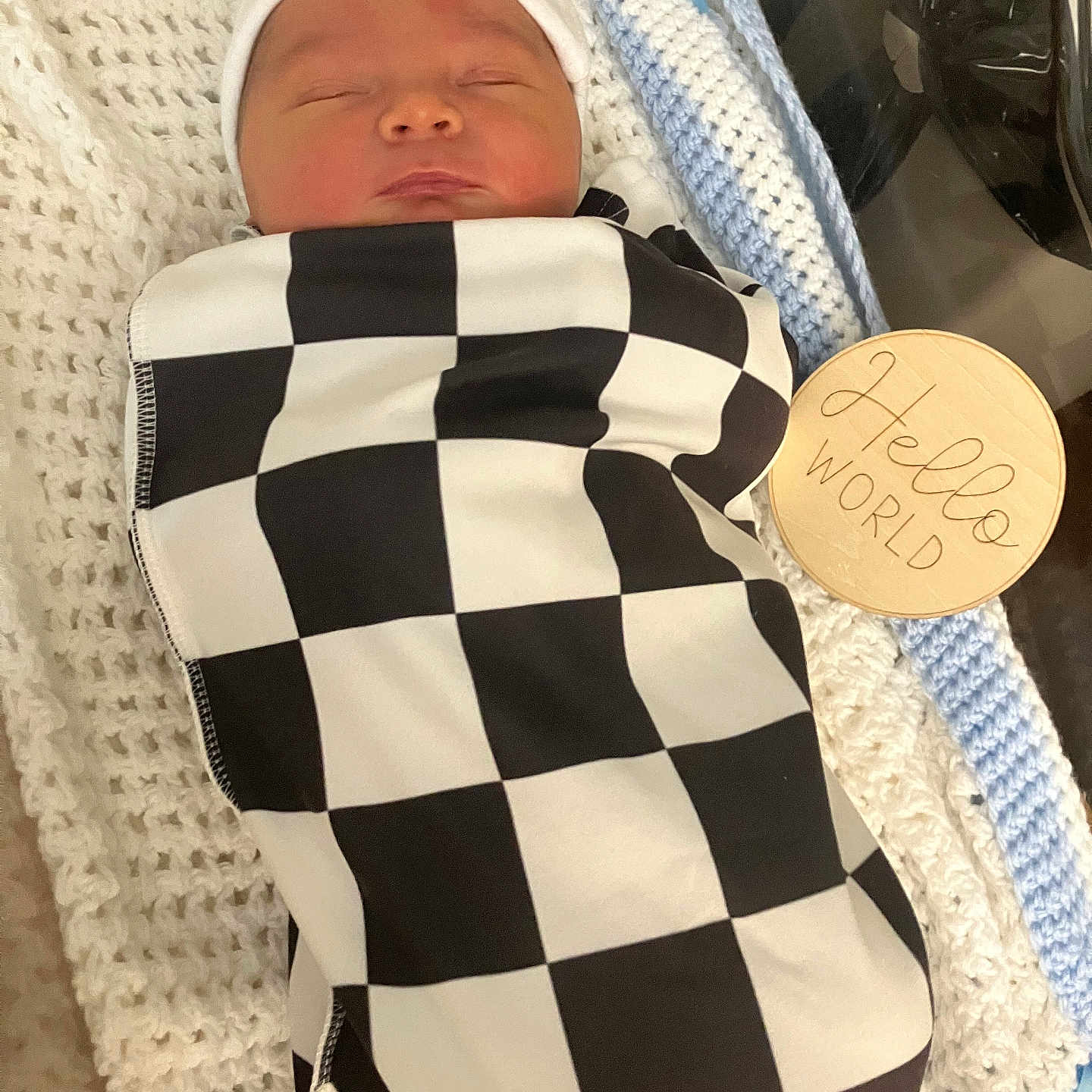 Phoenix is registered to the contest to win money with this photo: baby, bed, blanket, clothing, cradle, crib, cushion, face, furniture, hat, head, homedecor, newborn, pattern, person, photography, portrait, quilt, shirt, sleeping