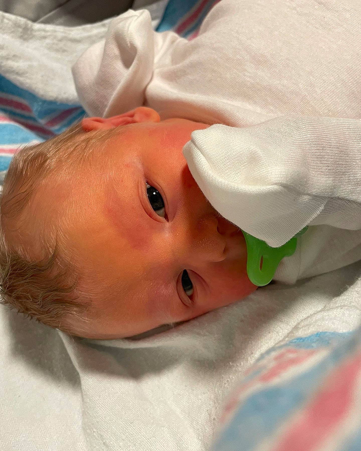 Amelia is registered to the contest to win money with this photo: baby, baby_toddler_clothing, cheek, child, comfort, eye, eyebrow, eyelash, face, head, headgear, iris, linens, lip, mouth, nose, person, skin, sleeve, textile