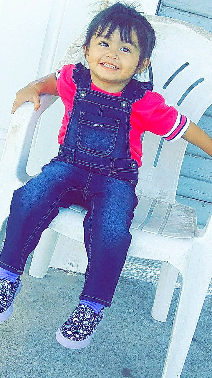 Rosaline is registered to the contest to win money with this photo: child, child_model, clothing, cool, denim, fun, happy, jeans, joy, leg, outerwear, person, pink, smile, textile, toddler, trousers