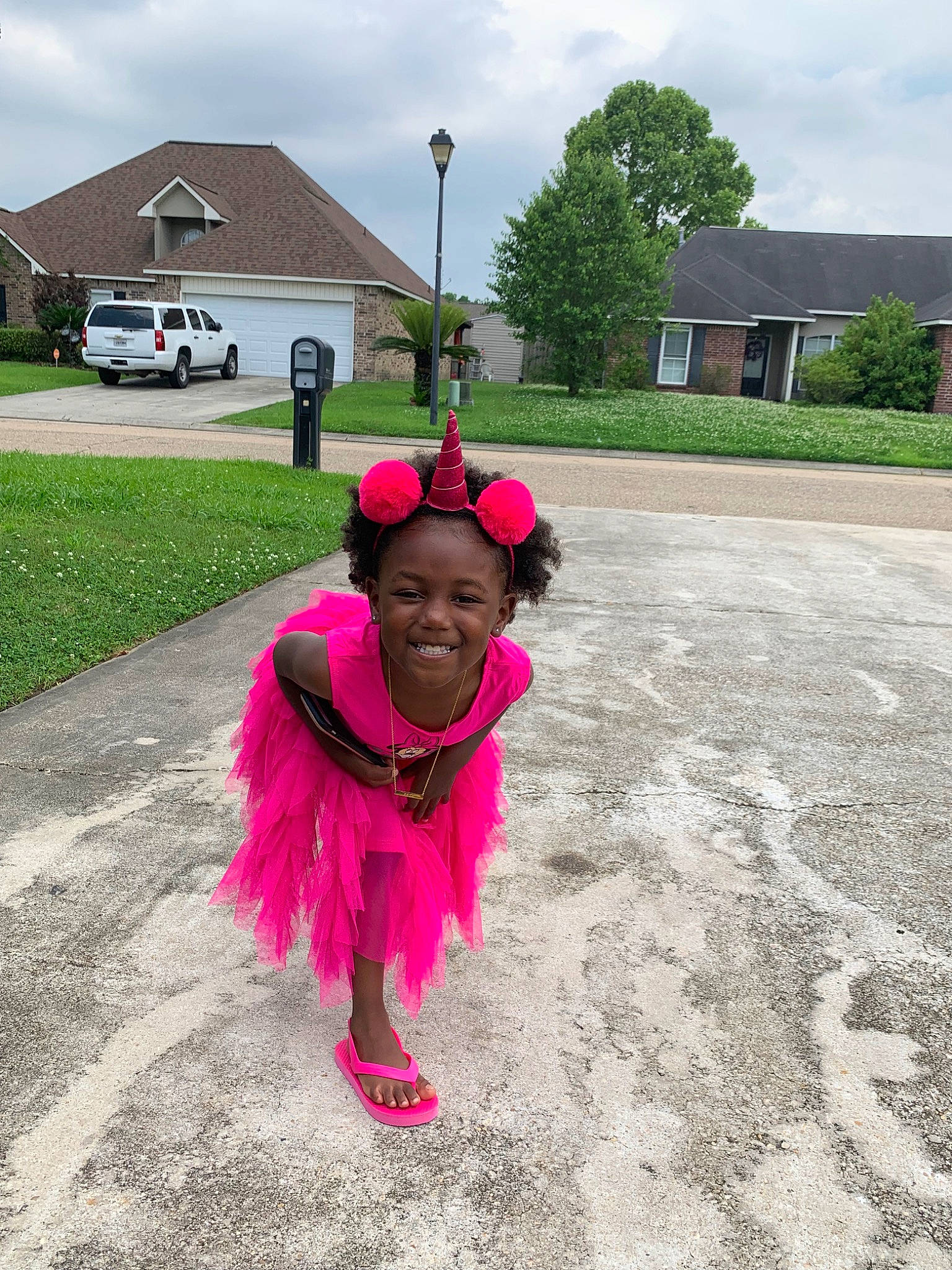 Bria joined the competition — help win amazing prizes! child, costume, fun, grass, happy, house, joy, magenta, person, pink, plant, play, recreation, road, smile, toddler, tree, vacation, walking