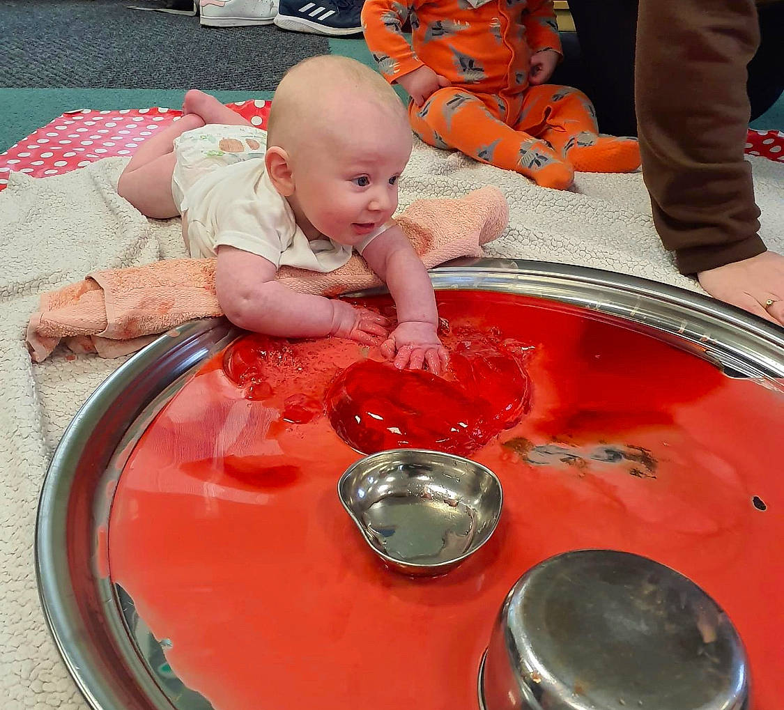 Jude is registered to the contest to win money with this photo: automotive_lighting, automotive_wheel_system, baby, baby_products, baby_toddler_clothing, baby_toys, bathing, chair, child, comfort, cooking, cookware_and_bakeware, fun, gas, person, plate, play, playground, sitting, table