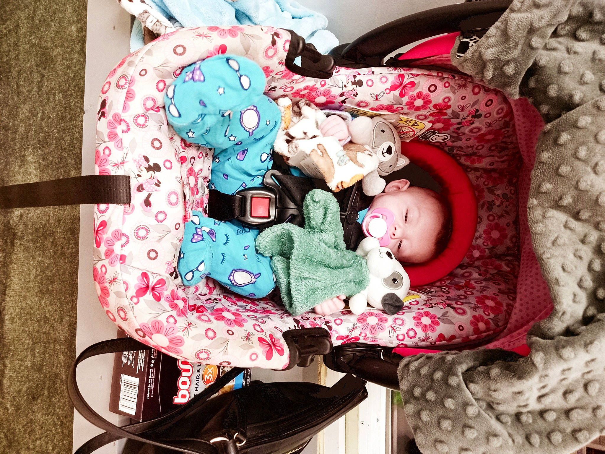 Alizabeth is registered to the contest to win money with this photo: baby, baby_carriage, baby_products, baby_sleeping, baby_toddler_clothing, bag, carmine, child, comfort, fashion_accessory, fictional_character, font, infant_bed, linens, magenta, pattern, person, pink, textile, toddler