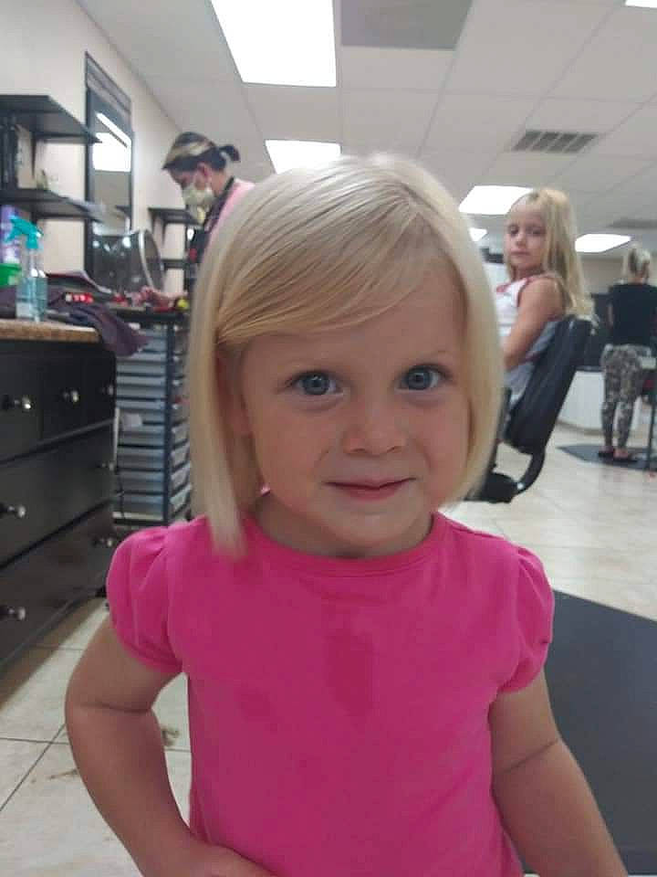 Mckinley is registered to the contest to win money with this photo: blond, cabinetry, chair, chest, drawer, event, flooring, fun, hairstyle, happy, iris, joint, joy, leisure, long_hair, person, shoulder, sleeve, smile, sportswear