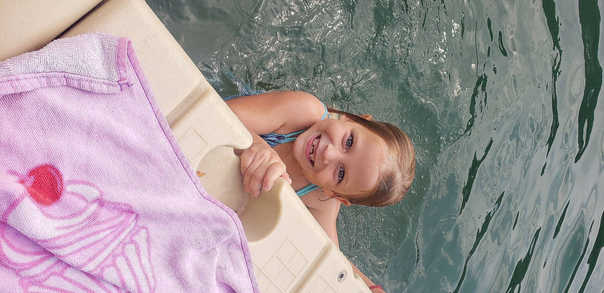 Mckinley is registered to the contest to win money with this photo: bathing, beach, beauty, child, dress, eyelash, fun, happy, human_body, joy, leisure, person, pink, play, portrait_photography, sand, skin, smile, toddler, tree