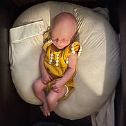 Everlee is registered to the contest to win money with this photo: baby, bed, bodypart, chair, couch, crib, cushion, face, finger, furniture, hand, head, homedecor, infantbed, newborn, person, photography, portrait, sitting, sleeping