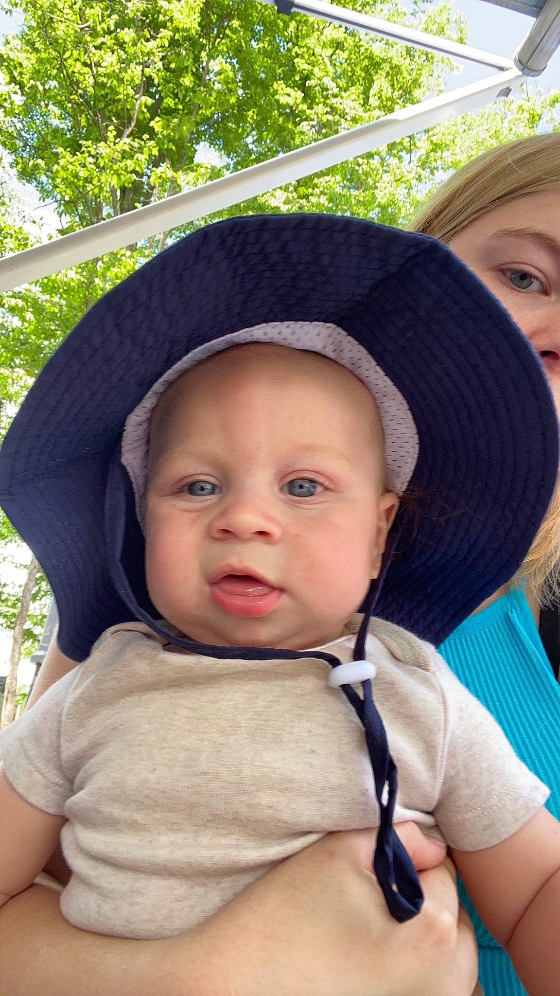 Ethan is registered to the contest to win money with this photo: baby, baby_toddler_clothing, cap, cool, eye, face, fedora, fun, grass, happy, hat, head, headgear, leisure, lip, person, skin, smile, sun_hat, toddler