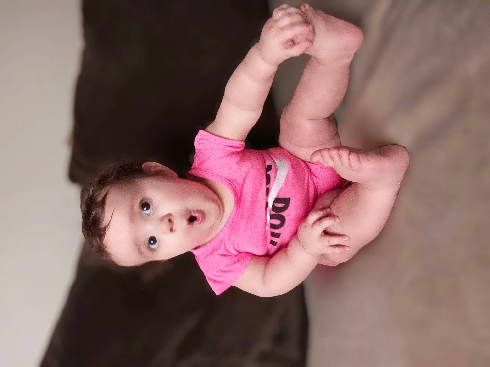 Evangeleen is registered to the contest to win money with this photo: baby, baby_toddler_clothing, cheek, chin, elbow, face, finger, flash_photography, gesture, happy, human_body, joint, leg, lip, mouth, nose, person, pink, shoulder, skin