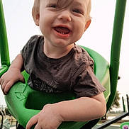 Austin joined the competition — help win amazing prizes! toddler, child, swing, playground, happy, smiling, outdoor, green, clothing, person, face, hair, hand, toy, fun, daylight, park, recreation, leisure, expression