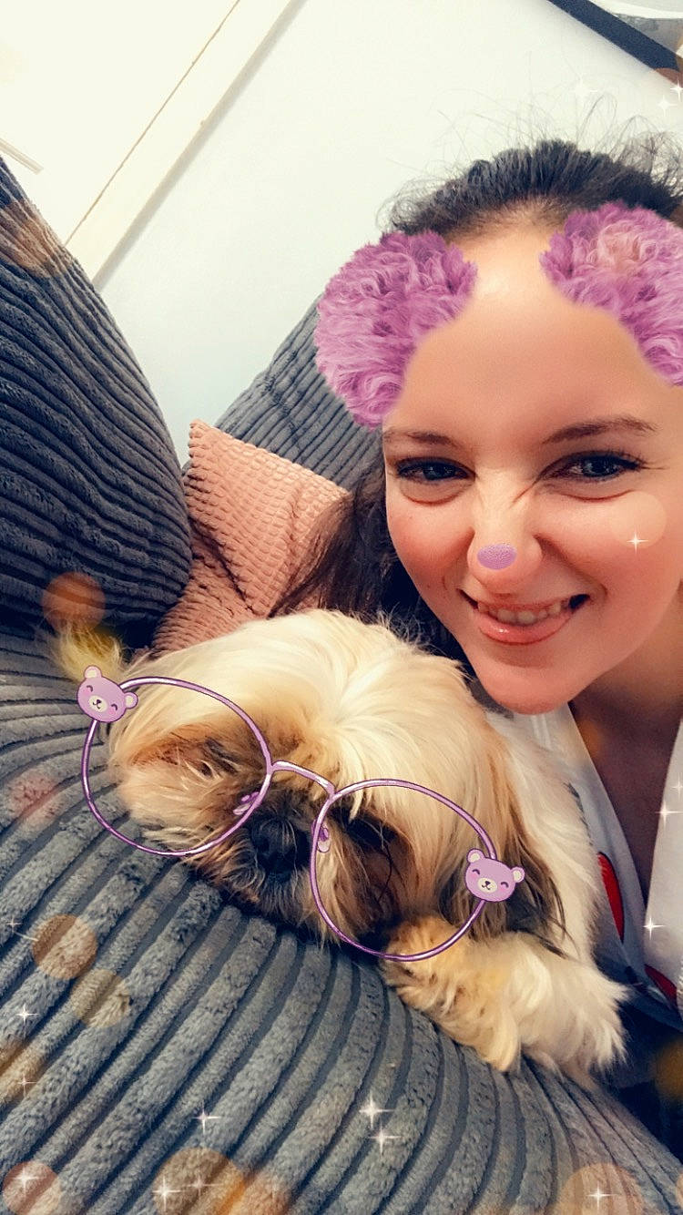 Dixie is registered to the contest to win money with this photo: black_hair, child, companion_dog, cool, eyebrow, eyewear, fawn, formal_wear, fun, fur, glasses, hairstyle, happy, iris, long_hair, pink, skin, smile, toy, vision_care