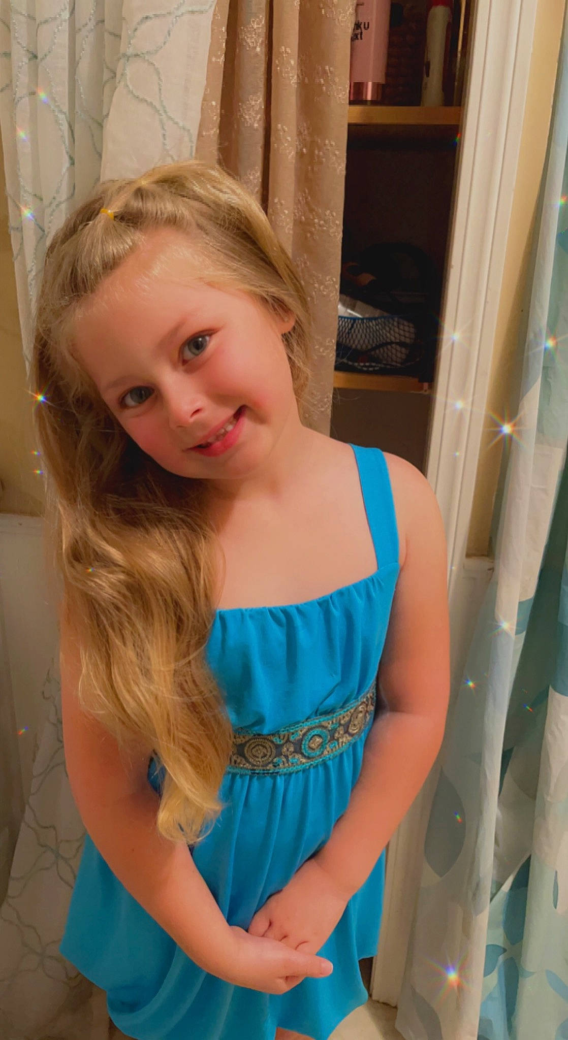 Annabell is registered to the contest to win money with this photo: blond, day_dress, door, dress, electric_blue, face, facial_expression, fun, hair, happy, head, iris, joy, long_hair, neck, one_piece_garment, person, shoulder, smile, standing