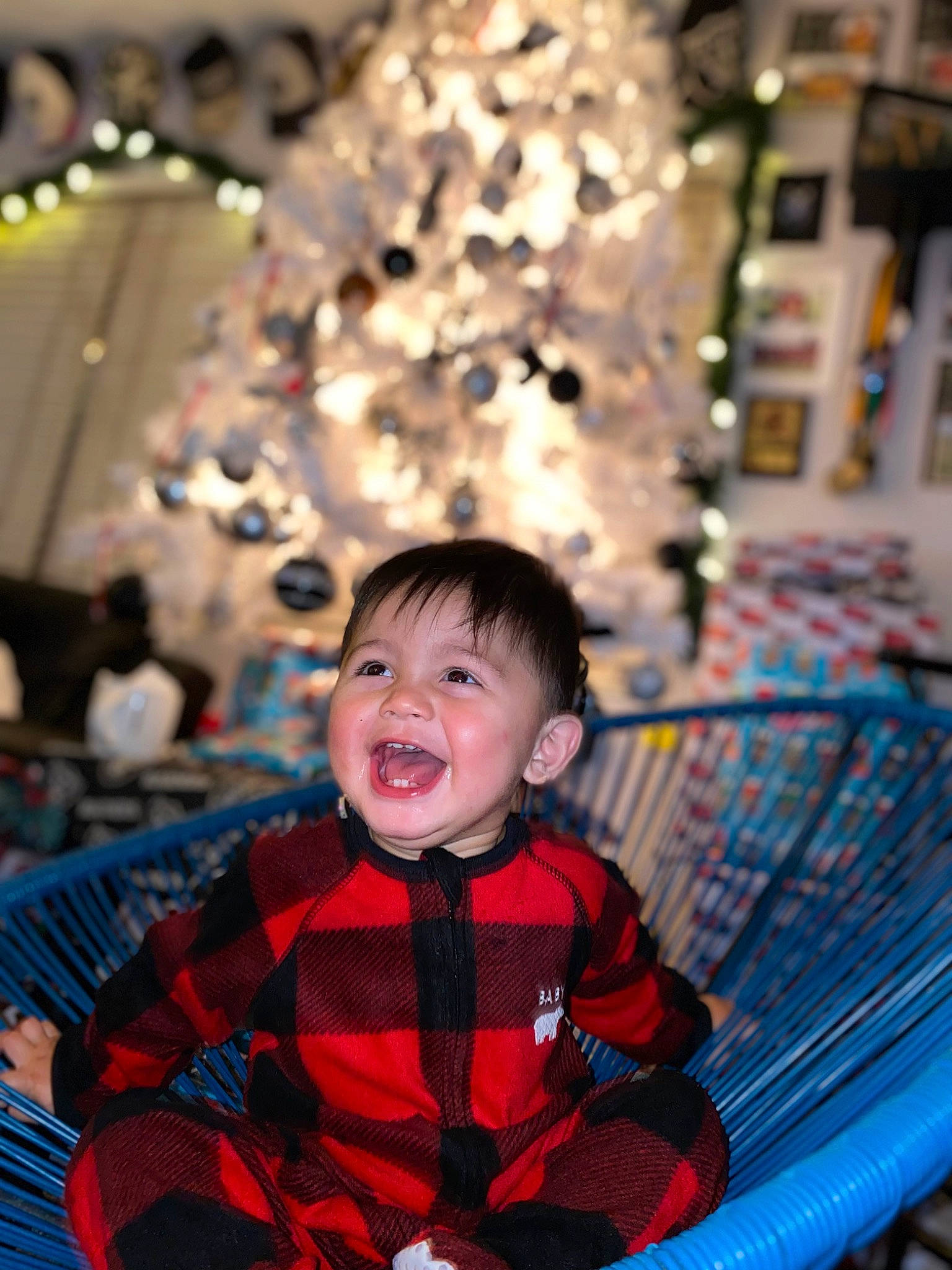 Kalvin joined the competition — help win amazing prizes! baby, baby_toddler_clothing, beauty, blue, child, christmas, christmas_decoration, christmas_tree, event, fun, happy, leisure, ornament, pattern, person, recreation, sitting, sleeve, smile, snapshot