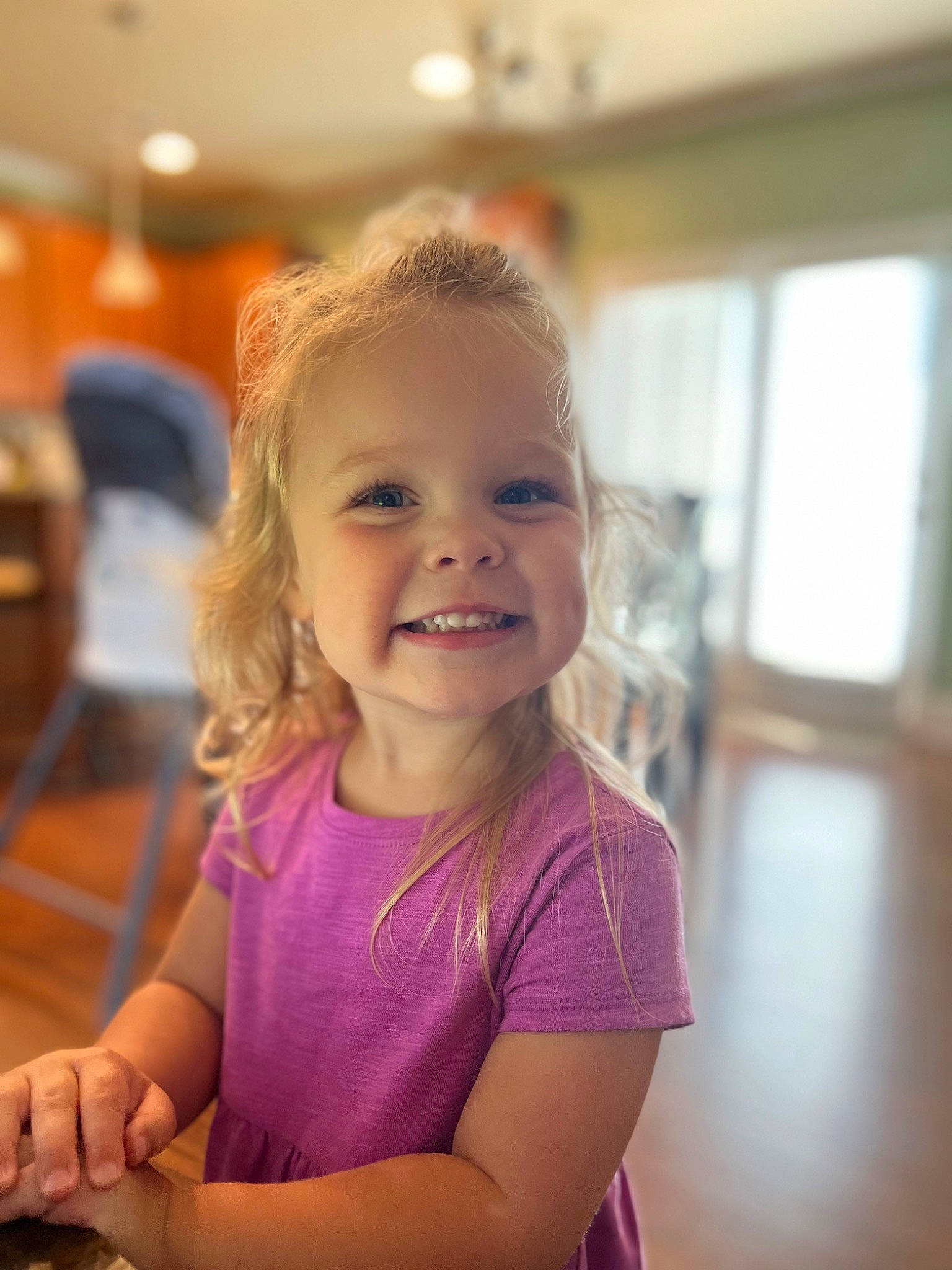 Saylor joined the competition — help win amazing prizes! baby, child, dress, event, flooring, fun, happy, joy, laugh, leisure, magenta, party, person, play, portrait_photography, recreation, room, sitting, smile, t_shirt