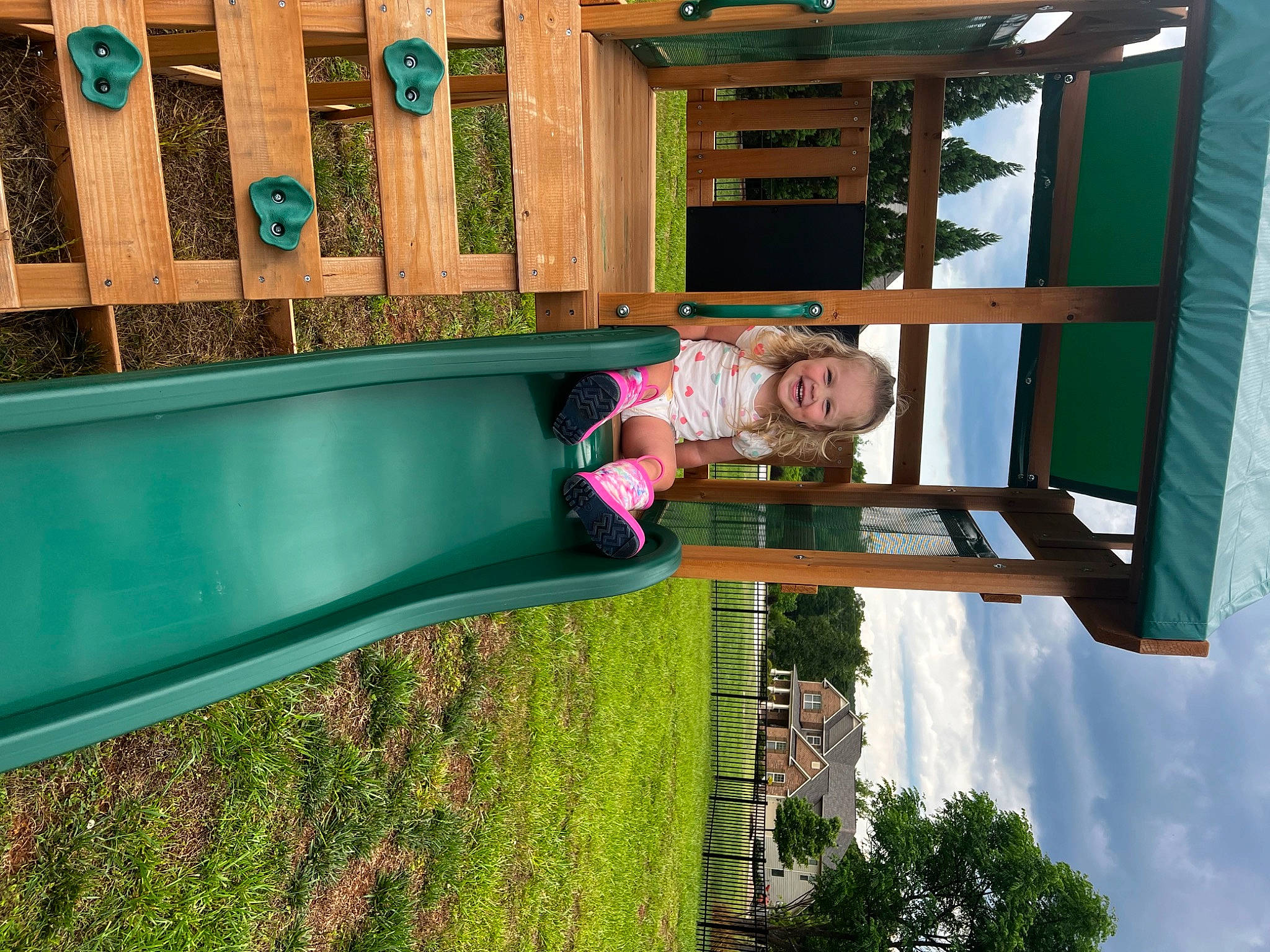 Saylor joined the competition — help win amazing prizes! child, chute, city, cloud, fun, grass, green, happy, joy, leisure, outdoor_play_equipment, person, plant, play, recreation, sky, smile, toddler, travel, tree