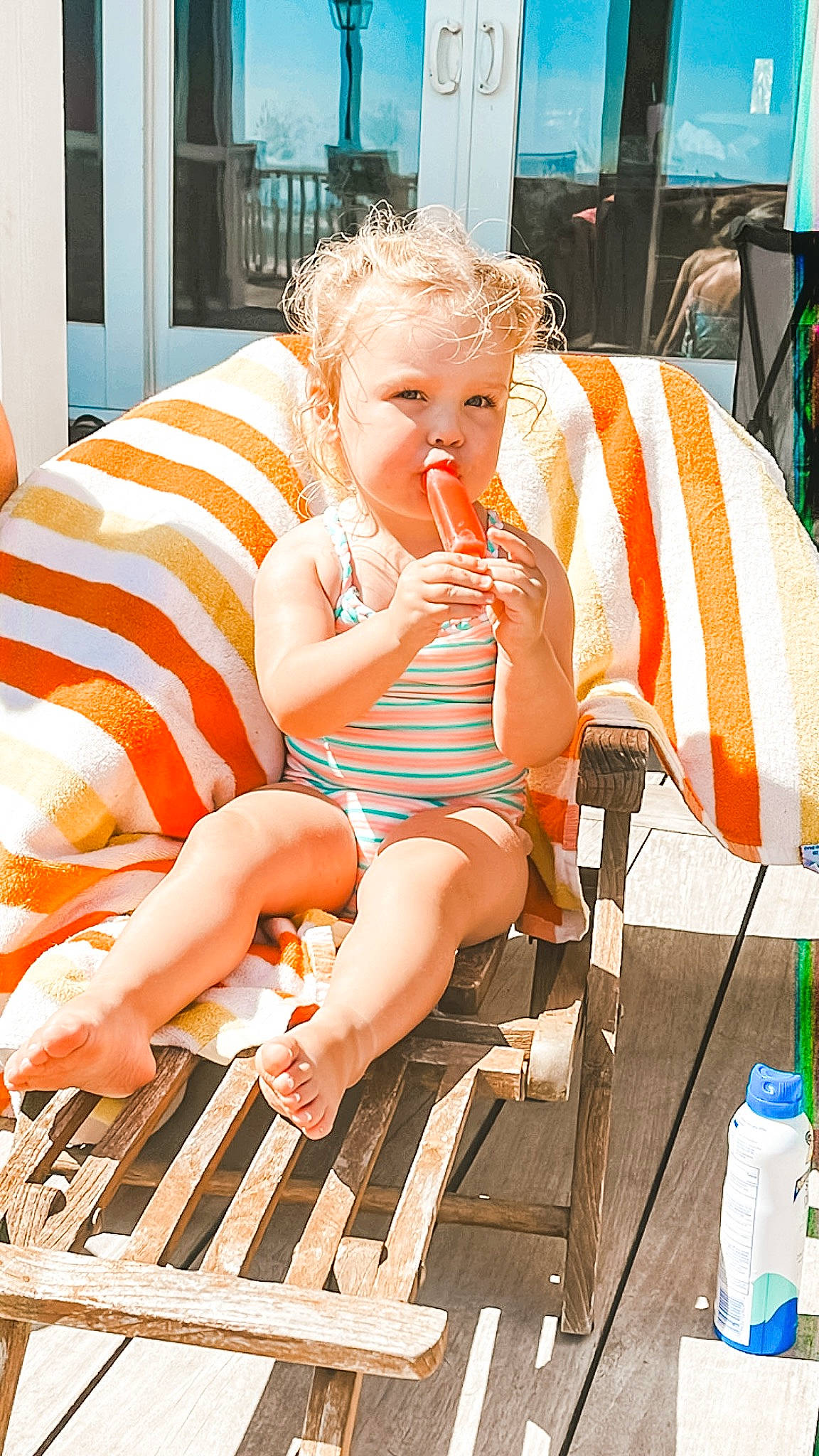 Saylor joined the competition — help win amazing prizes! baby, baby_toddler_clothing, barefoot, blue, child, comfort, event, facial_expression, foot, fun, human_leg, lap, leisure, orange, person, shorts, sitting, skin, thigh, toddler