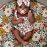 Tallulah is registered to the contest to win money with this photo: baby, beanbag, blanket, cushion, face, furniture, head, homedecor, person, photography, pillow, portrait