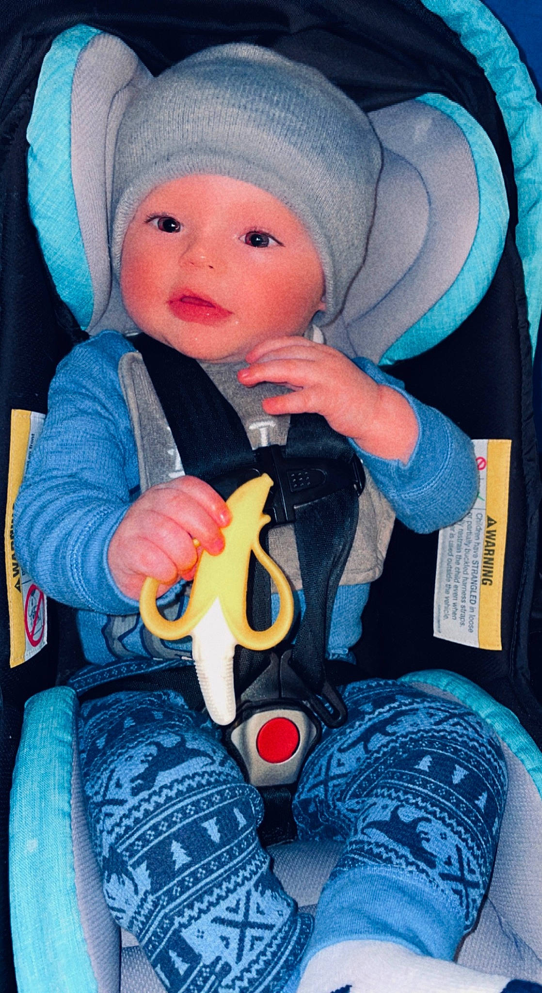 Deacon joined the competition — help win amazing prizes! baby, baby_carriage, baby_safety, baby_toddler_clothing, blue, cheek, comfort, face, facial_expression, finger, headwear, human_body, lap, organ, outerwear, person, product, red, skin, smile
