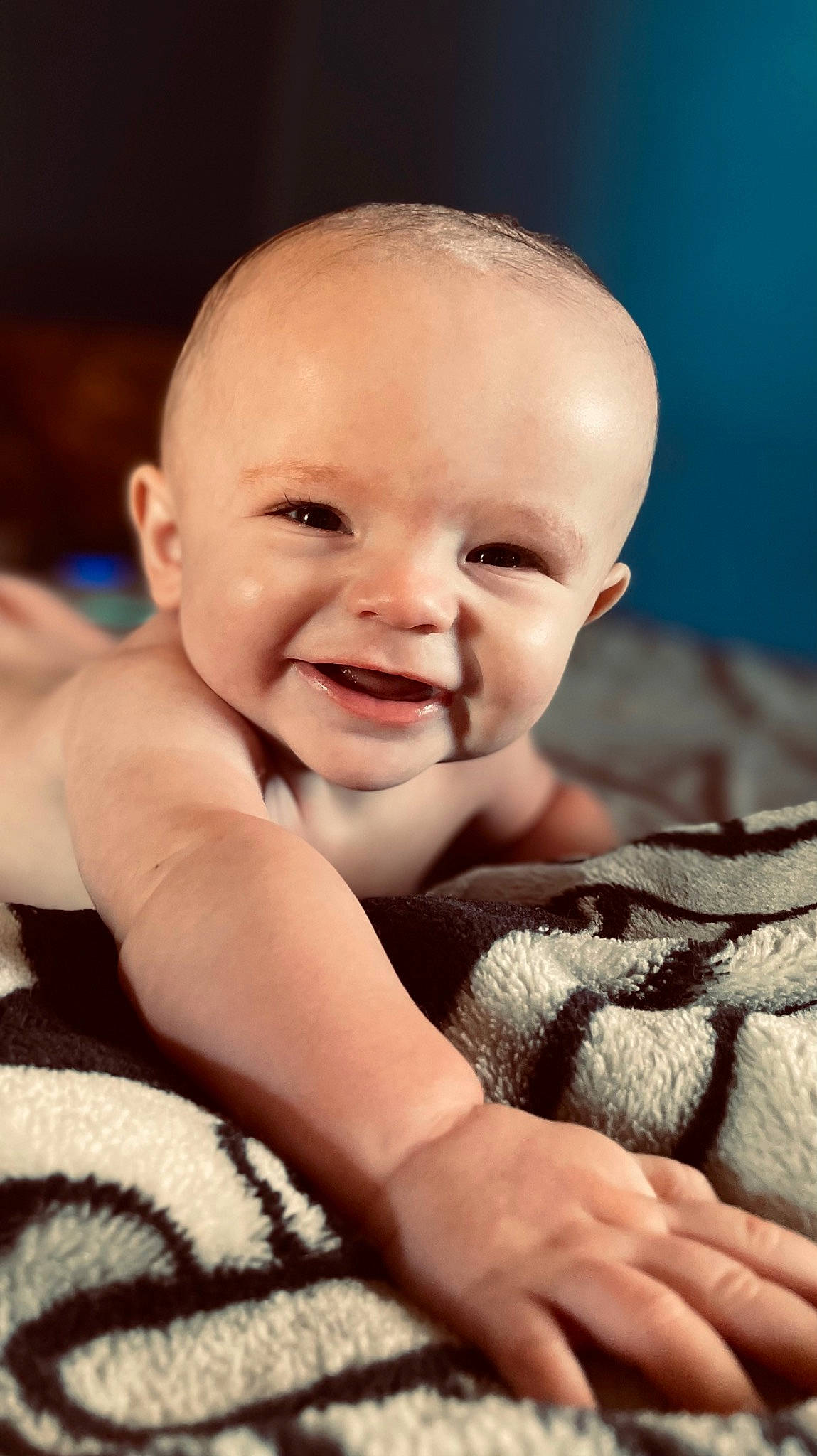 Deacon is registered to the contest to win money with this photo: baby, baby_toddler_clothing, cheek, child, close_up, finger, flash_photography, fun, fur, gesture, hand, happy, joy, neck, pattern, person, portrait_photography, sitting, skin, smile